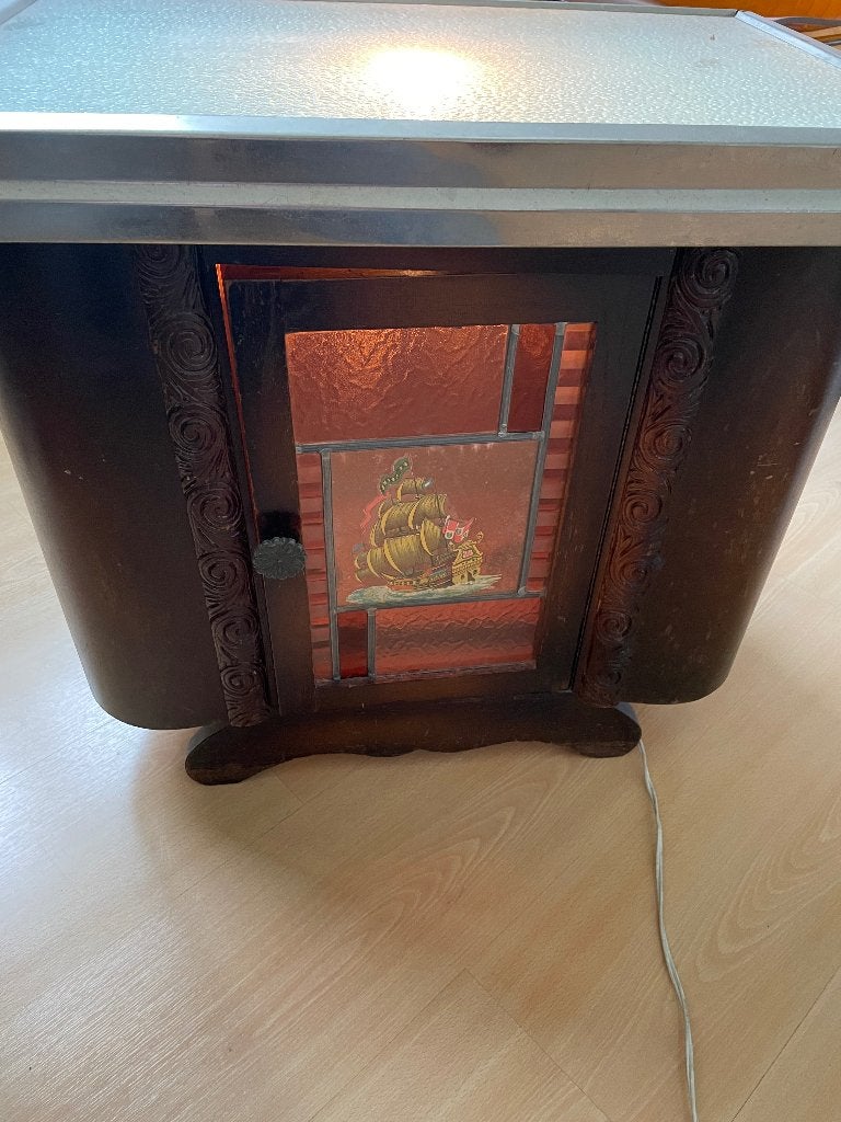 Vintage drankenkastje, Ophalen