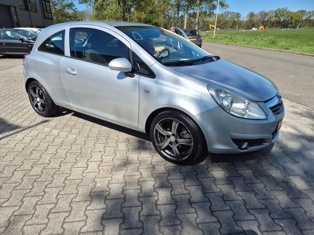 Opel Corsa 2009 Grijs, Auto's, Bedrijf, Handgeschakeld, 1364 cc, Zilver of Grijs