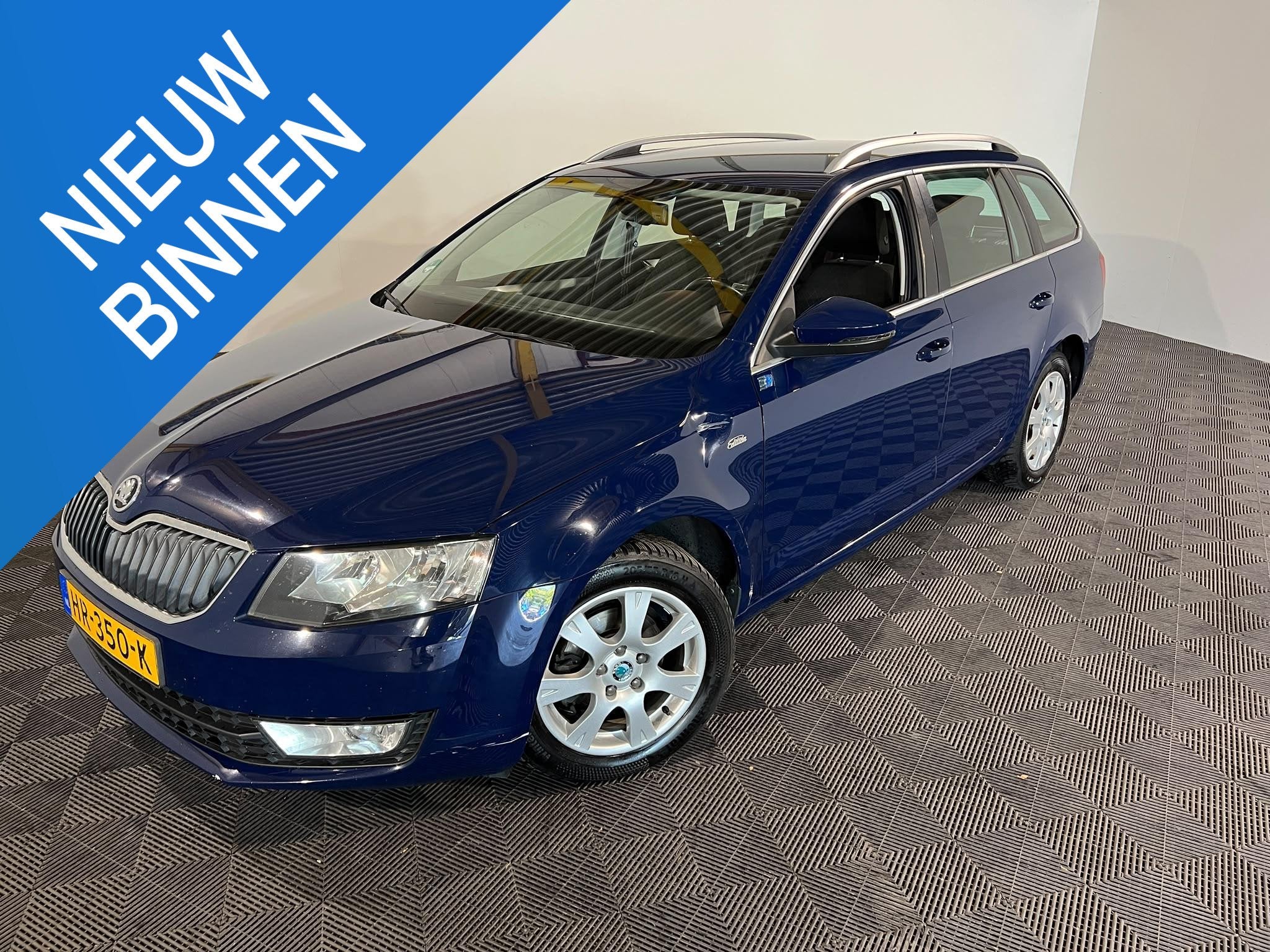 Skoda Octavia Combi 1.6 TDI Greentech Edition Businessline, Auto's, Stof, Gebruikt, Blauw, Origineel Nederlands
