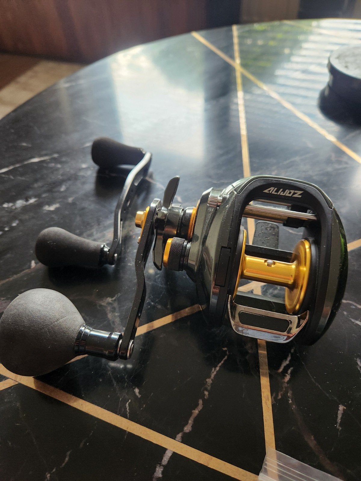 AliJoz Baitcasting Molen - Zo goed als nieuw Meerval, Ophalen of Verzenden, Zo goed als nieuw, Molen