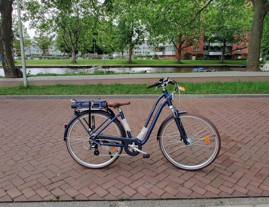 Electric city bike Elops 900 E, Ophalen of Verzenden, Zo goed als nieuw, 50 km per accu of meer, Overige merken