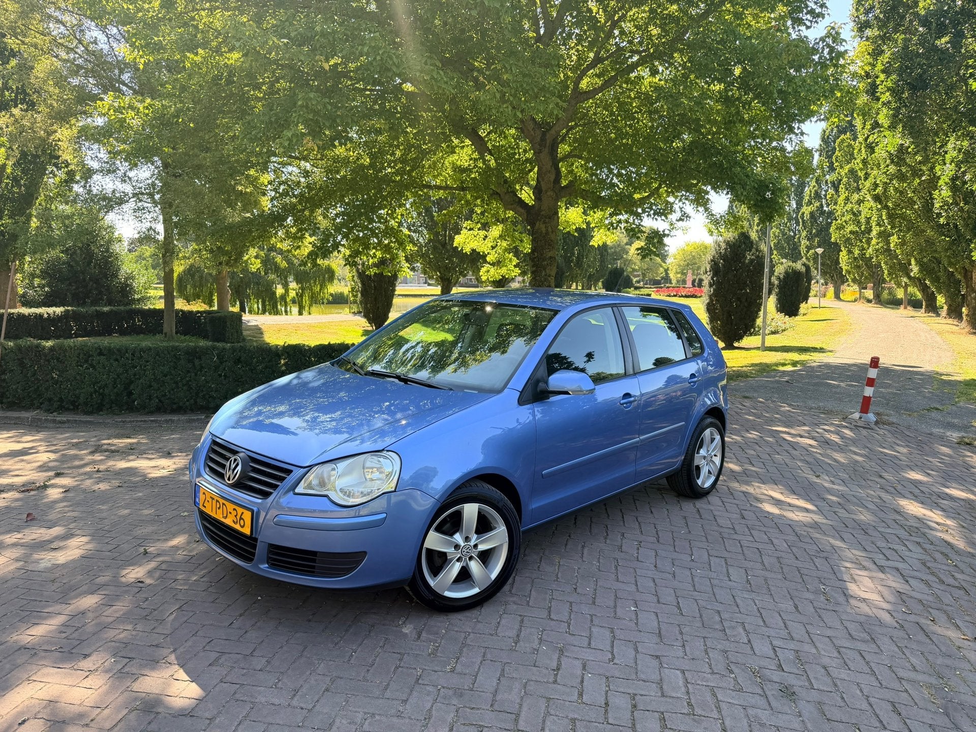 Volkswagen Polo 1.4-16V Comfortline | Cruise | Airco | Sport, Voorwielaandrijving, Stoelverwarming, Stof, Zwart