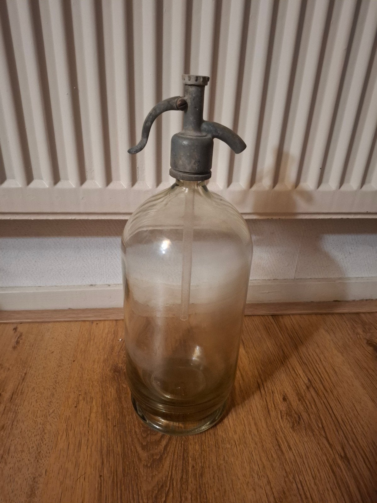 antiek water spuit fles, Ophalen