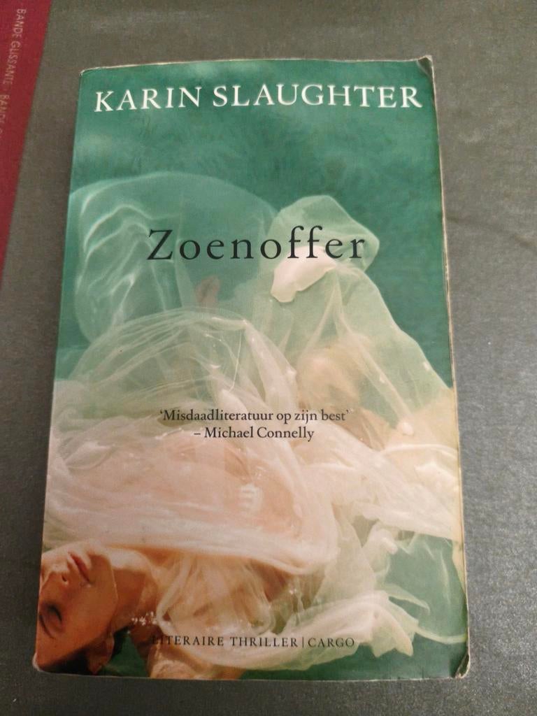 Karin Slaughter - Zoenoffer, Ophalen of Verzenden, Zo goed als nieuw, Karin Slaughter
