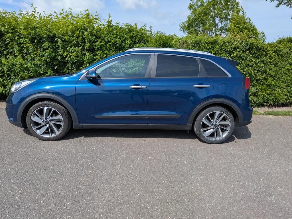 Kia Niro 1.6 GDi Hybrid 141pk Dct6 2018 Blauw, Blauw, Leder en Stof, 23 km/l, Dealer onderhouden