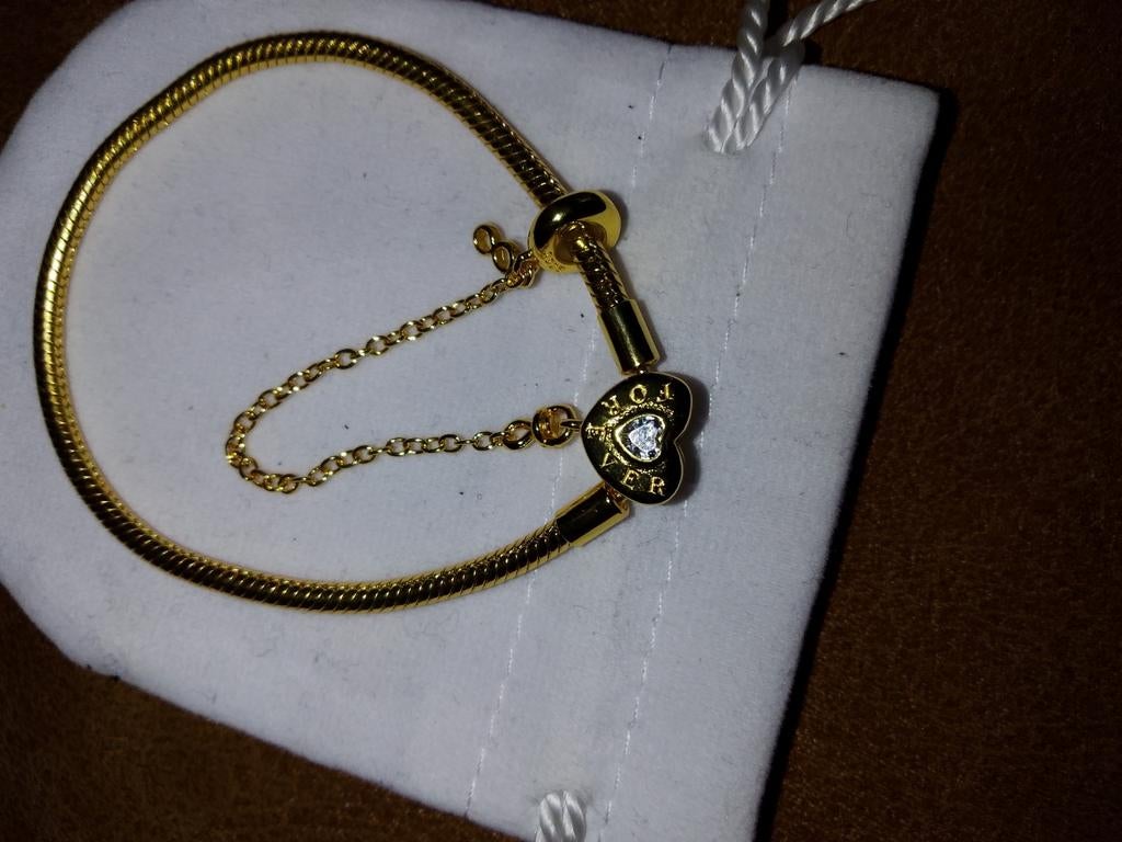 Goudkleurige bedelarmband met zirkonia en infinity hanger, Ophalen of Verzenden