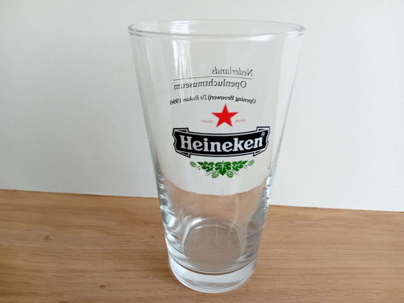Heineken glas met achteropdruk uit 1996, Ophalen of Verzenden, Zo goed als nieuw, Glas of Glazen, Heineken