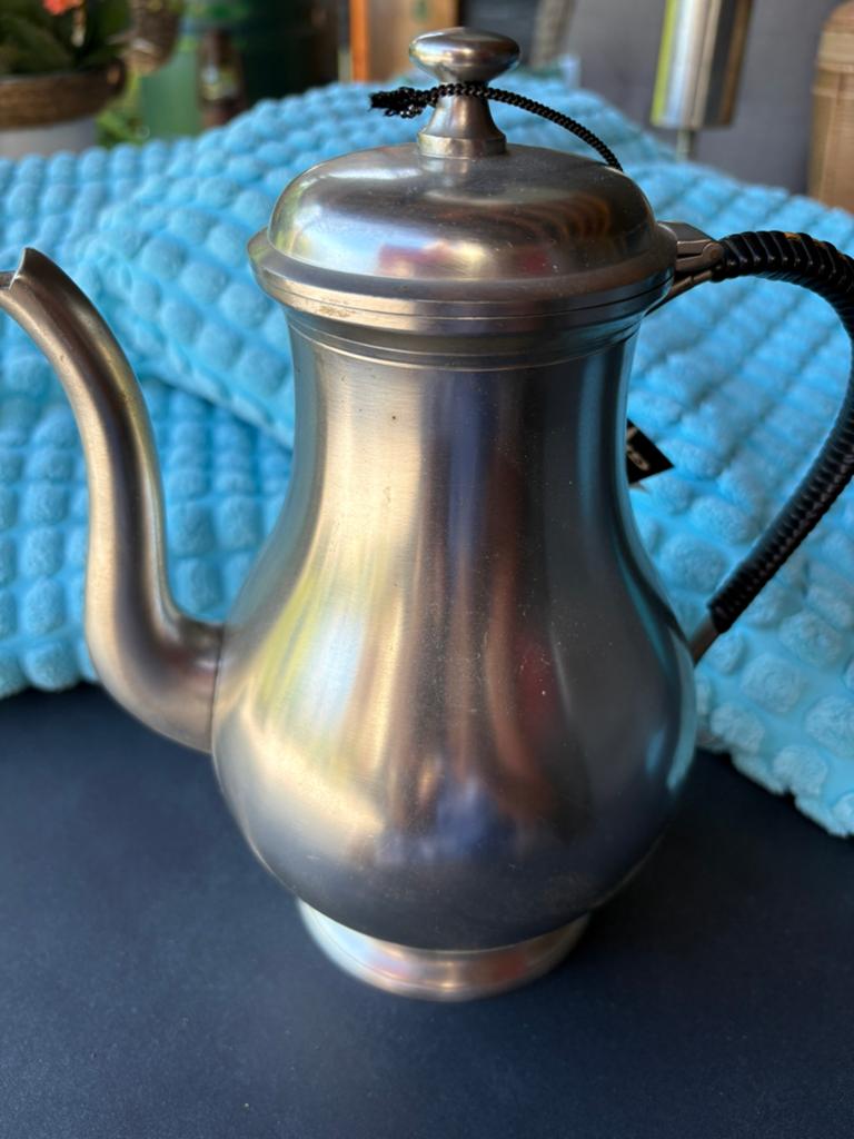 Tinnen koffiepot, Ophalen