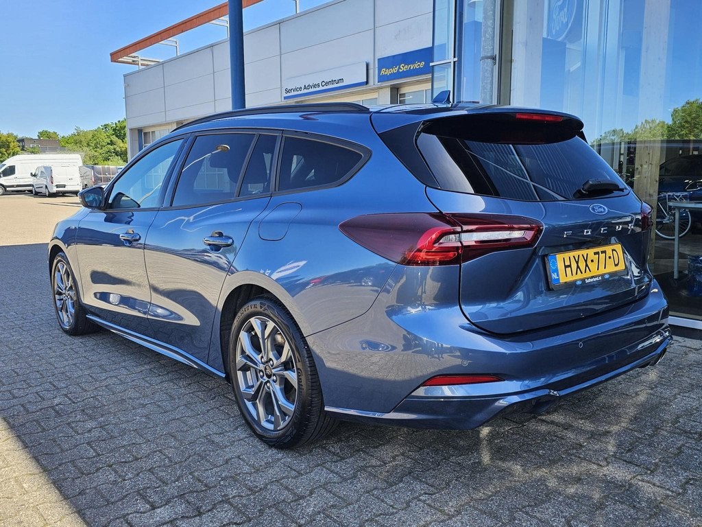 Ford Focus Wagon 1.0 EcoBoost Hybrid ST Line | Chrome Blue |, Stof, Gebruikt, 1404 kg, Blauw