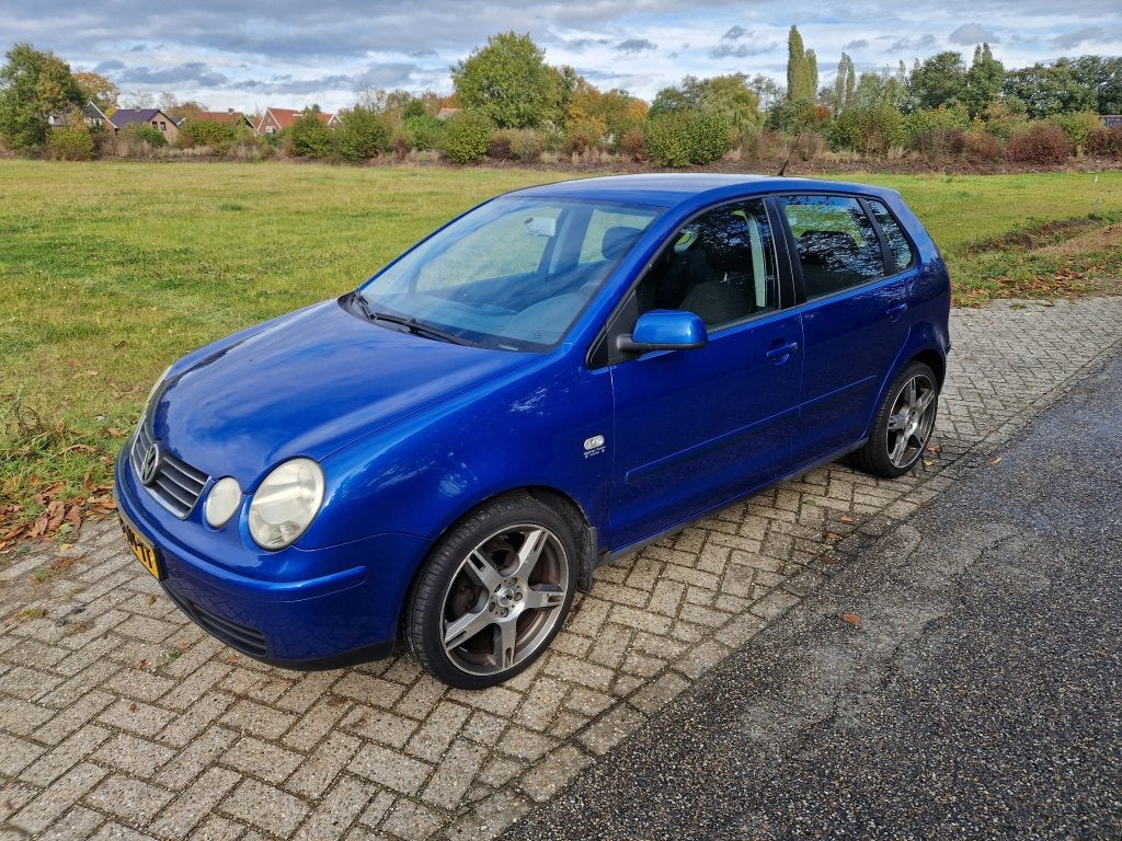Volkswagen Polo 1.4 55KW 2004 Blauw, Auto's, Voorwielaandrijving, 4 cilinders, Blauw, Origineel Nederlands
