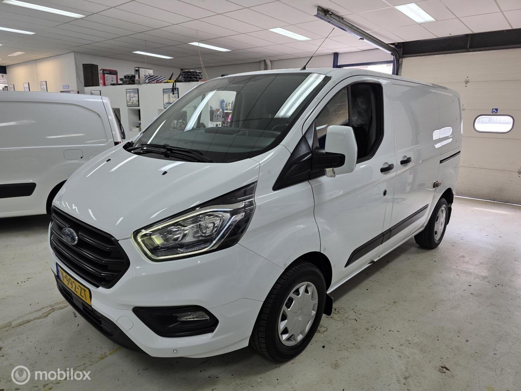 Ford Transit Custom 300 2.0 TDCI L1H1 Airco Cruise, Gebruikt, 4 cilinders, Wit, Origineel Nederlands