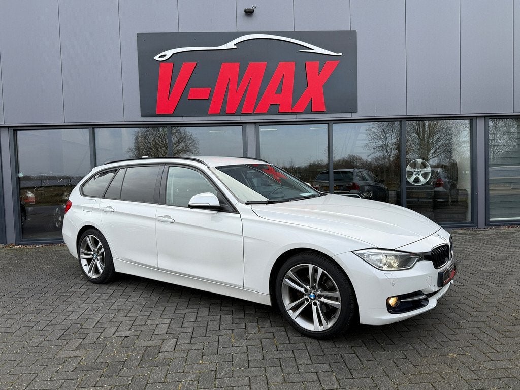 BMW 320i Touring AUT Sport Executive Leder Xenon Pdc Stoelve, Auto's, BMW, Automaat, Achterwielaandrijving, Gebruikt, 4 cilinders