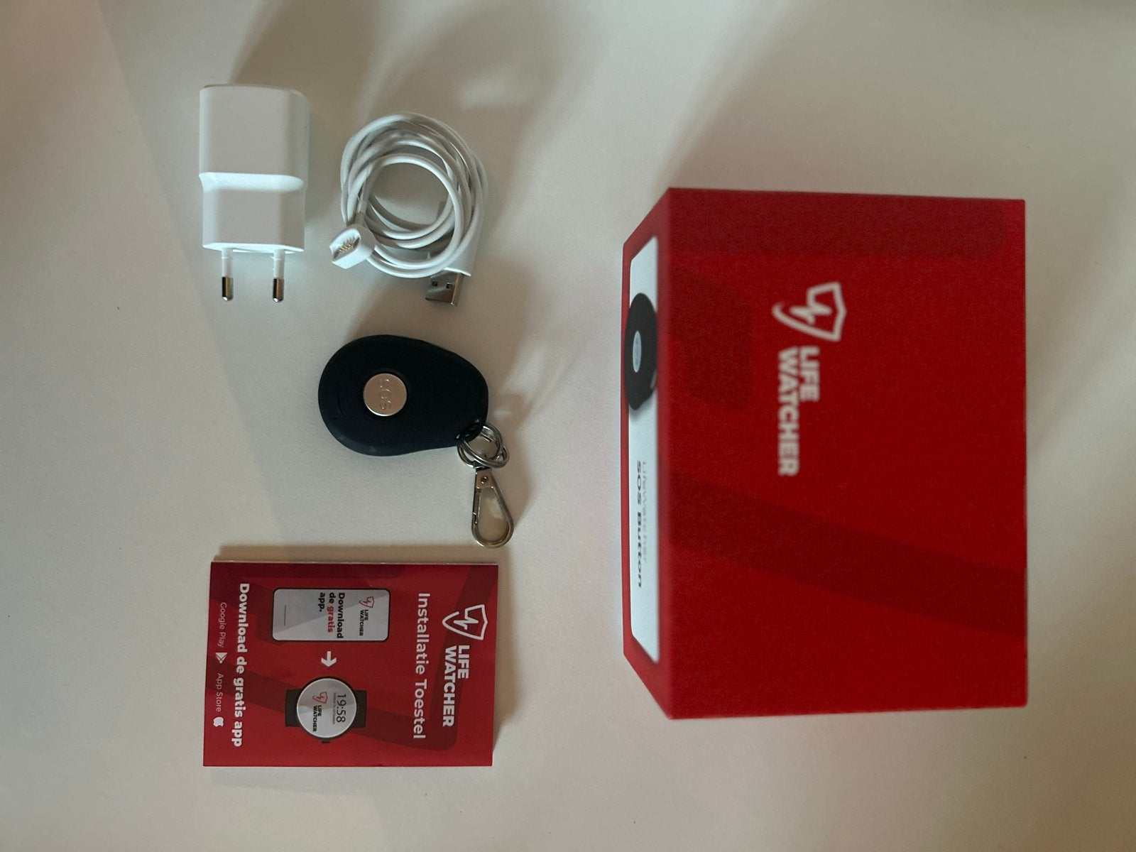 LifeWatcher SOS Button met oplader en in doos, Ophalen of Verzenden, Zo goed als nieuw