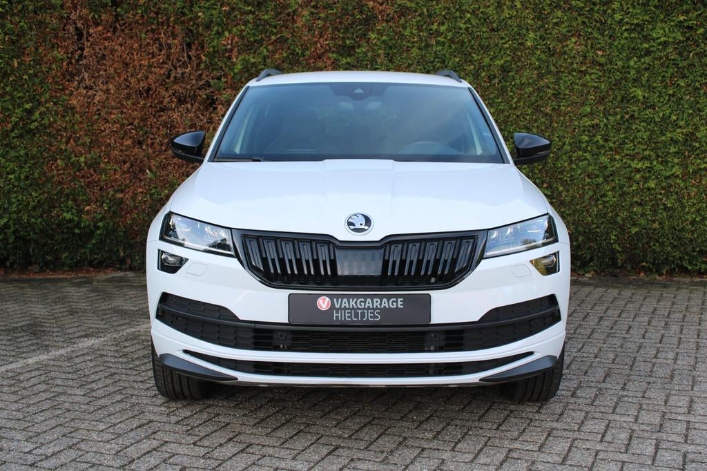 Skoda Karoq 1.5 TSI ACT Sportline Business, Auto's, Skoda, Stof, 4 cilinders, 150 pk, Wit