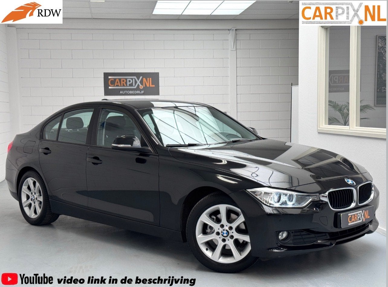 BMW 3-serie 316i High Executive (bj 2014, automaat), Auto's, BMW, Automaat, Gebruikt, 4 cilinders, Zwart