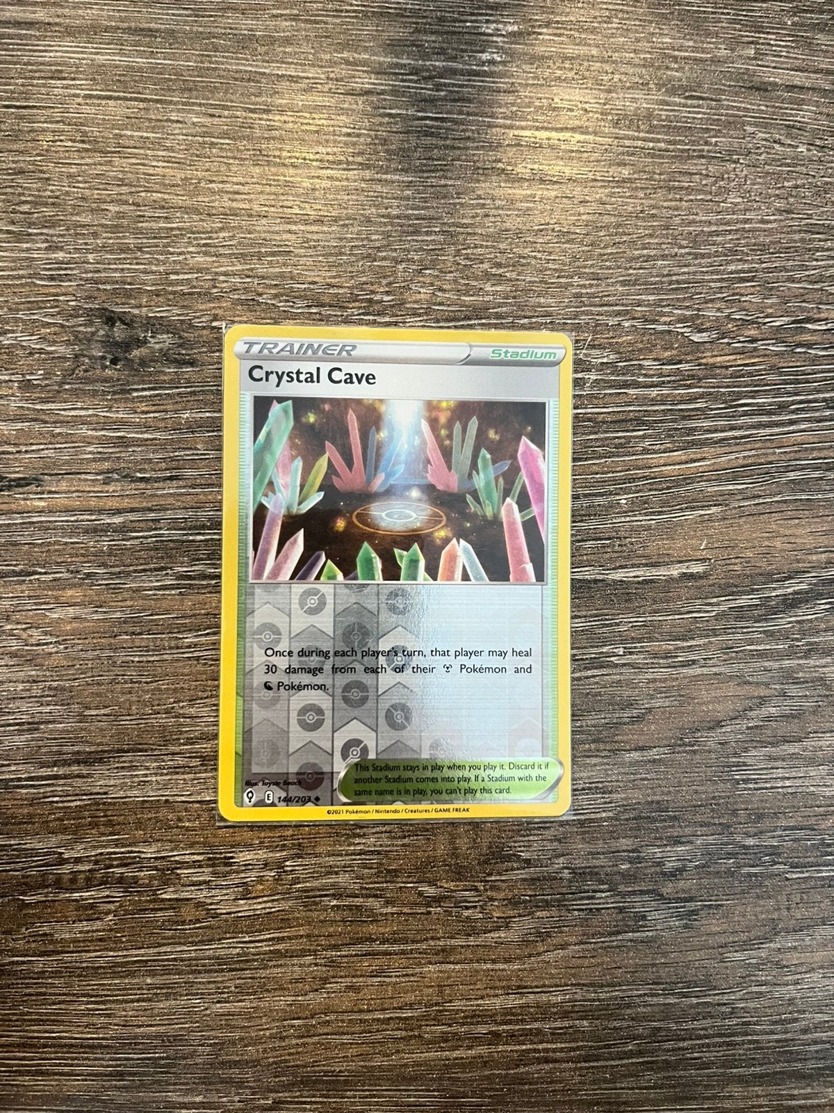 Crystal Cave EVS 144/203 reverse holo, Ophalen of Verzenden, Zo goed als nieuw