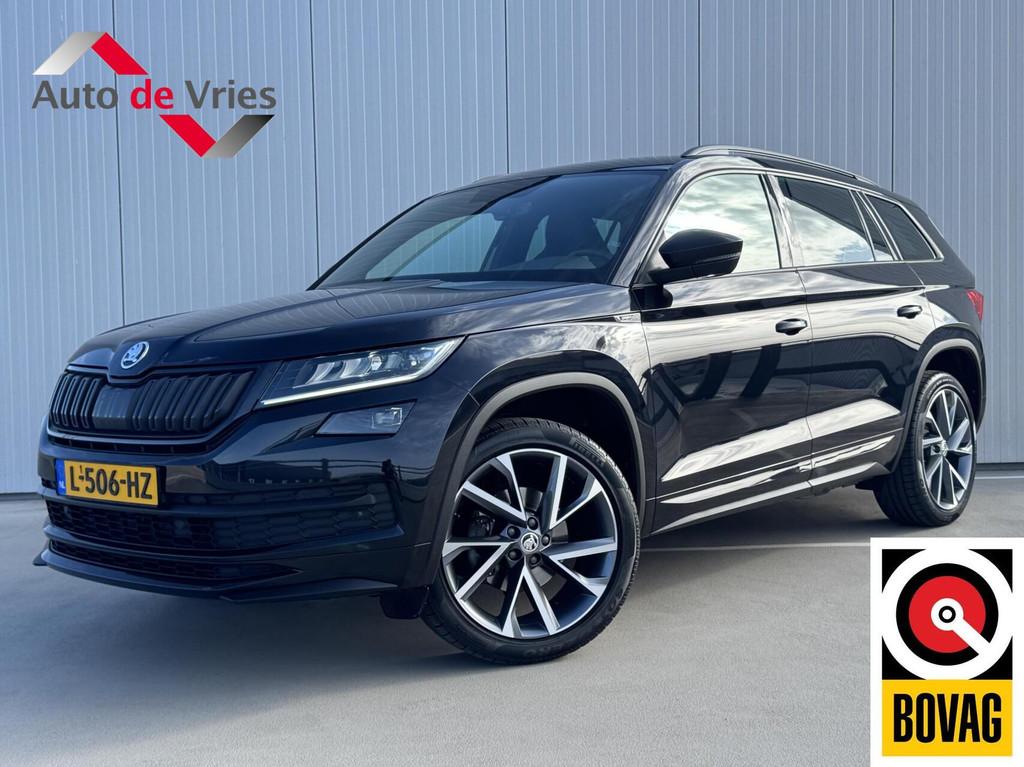 Skoda Kodiaq 1.5 TSI Sportline Business|Trekhaak|NL-Auto, Auto's, Skoda, Voorwielaandrijving, 4 cilinders, 150 pk, Zwart