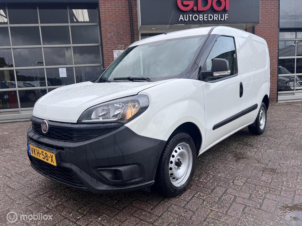 Fiat Doblò Cargo 1.3 MJ L1H1 84000km Trekhaak Airco., Auto's, Euro 6, Wit, Origineel Nederlands, Bedrijf