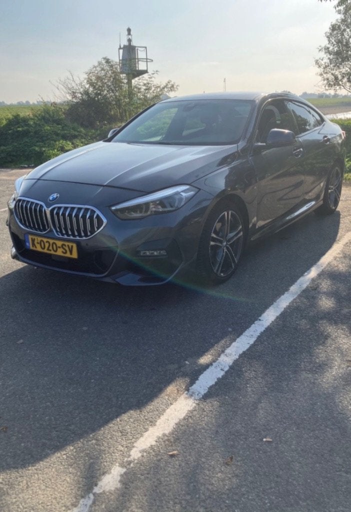 BMW 2-Serie Gran Coupé 218i 140pk Aut 2020 Grijs, Auto's, Automaat, Achterwielaandrijving, 1350 kg, Leder en Stof