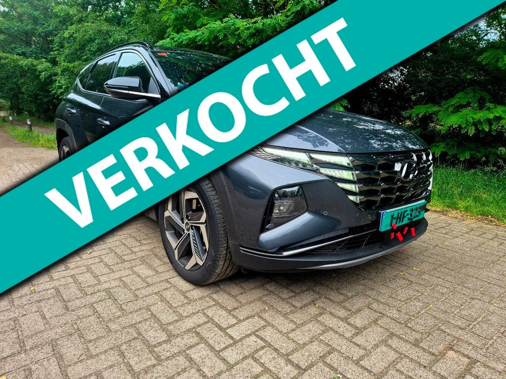 Hyundai Tucson 1.6 T-GDI HEV Comfort 230 pk / camera, Stof, Gebruikt, 4 cilinders, 1650 kg