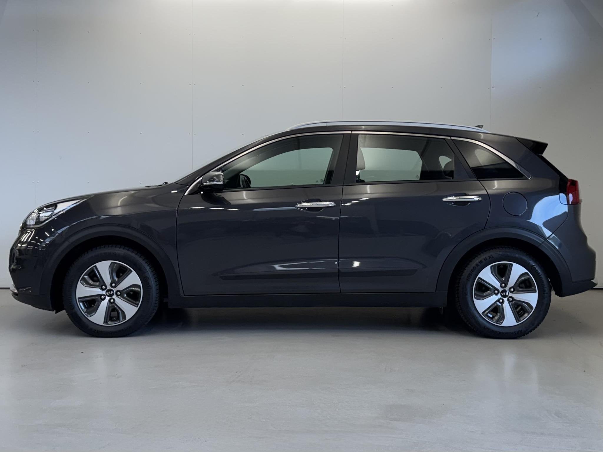 Kia Niro 1.6 GDi Hybrid First Edition | Clima | NL Auto | Tr, Auto's, 12 maanden, Gebruikt, Euro 6, Leder en Stof