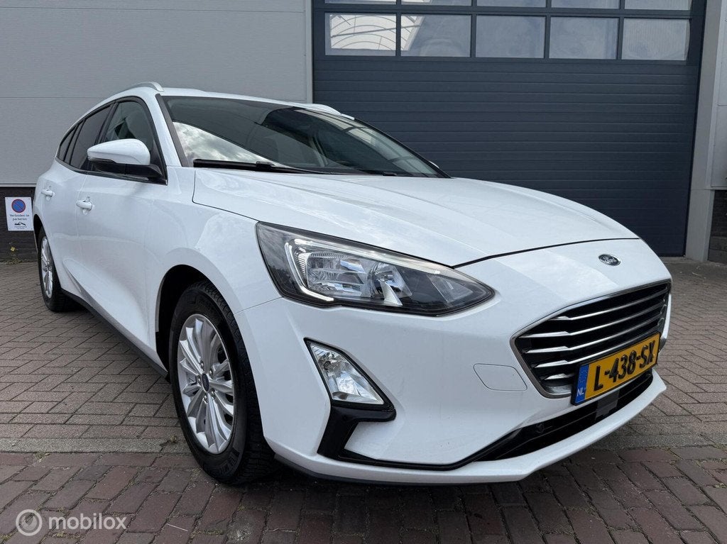 Ford Focus Wagon 1.0 EcoBoost Titanium X Business, Auto's, Ford, 1328 kg, 125 pk, Gebruikt, Euro 6