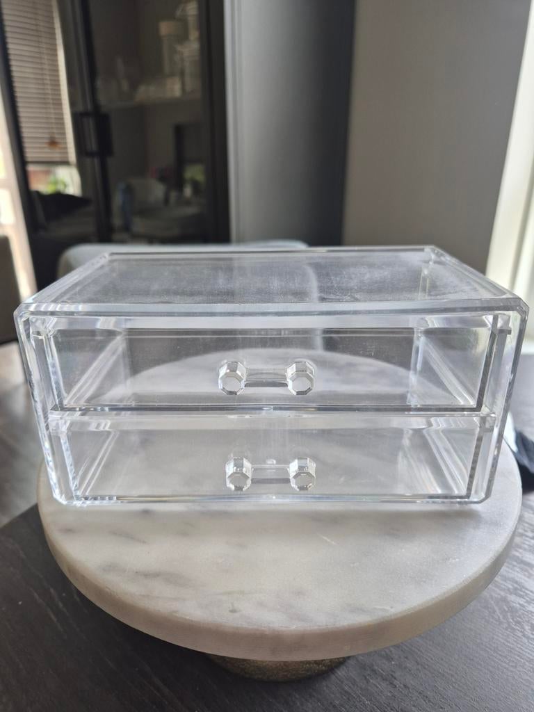 Lade bakje voor make-up, Ophalen