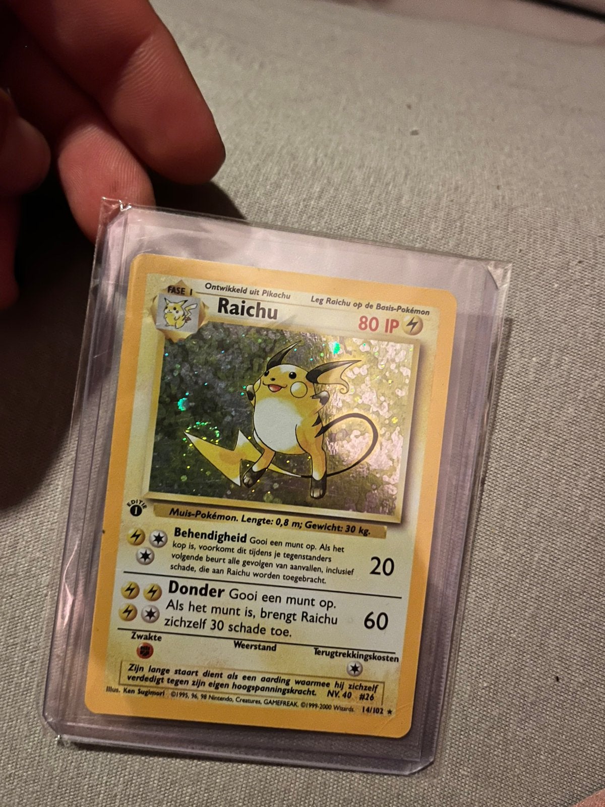 Pokemon Dutch #14 1 edtion Raichu, Ophalen of Verzenden, Zo goed als nieuw, Losse kaart, Foil