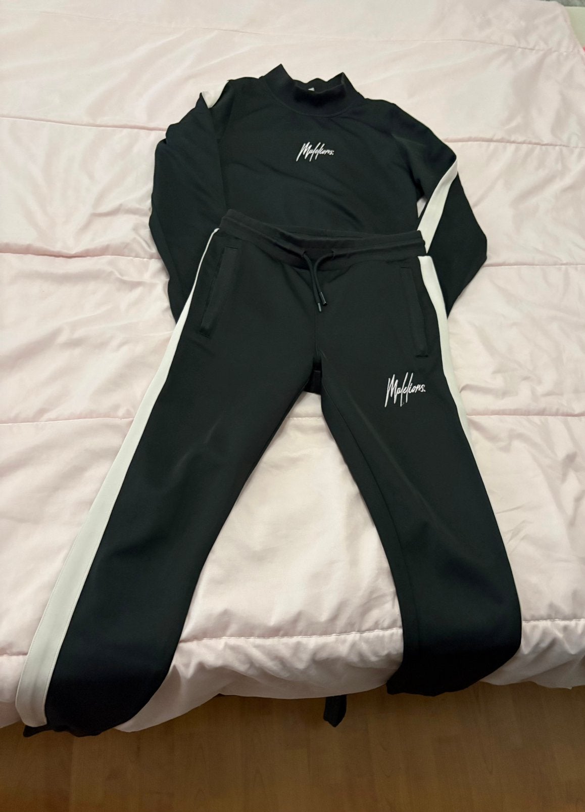 Malelions trainingspak zwart/roze, Zwart, Overige typen, Ophalen of Verzenden, Zo goed als nieuw