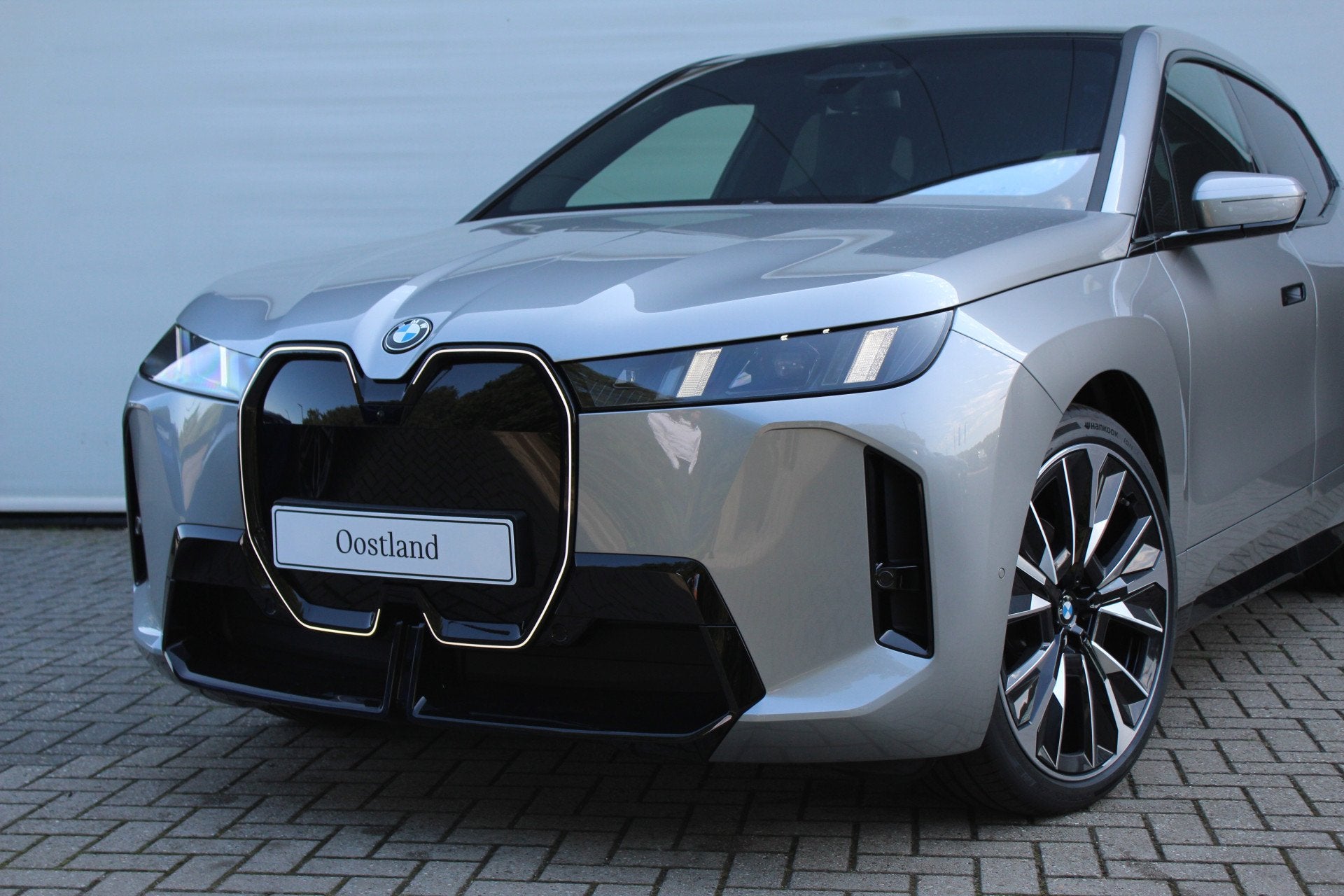 BMW iX xDrive45 M Sport / Trekhaak / Panoramadak Sky Lounge, Auto's, Automaat, Dealer onderhouden, Zwart, IX