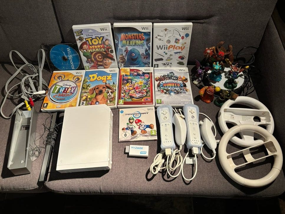 Nintendo Wii set met 2 controllers, 2 sturen en 9 games, Spelcomputers en Games, Ophalen of Verzenden, Gebruikt, Met 2 controllers