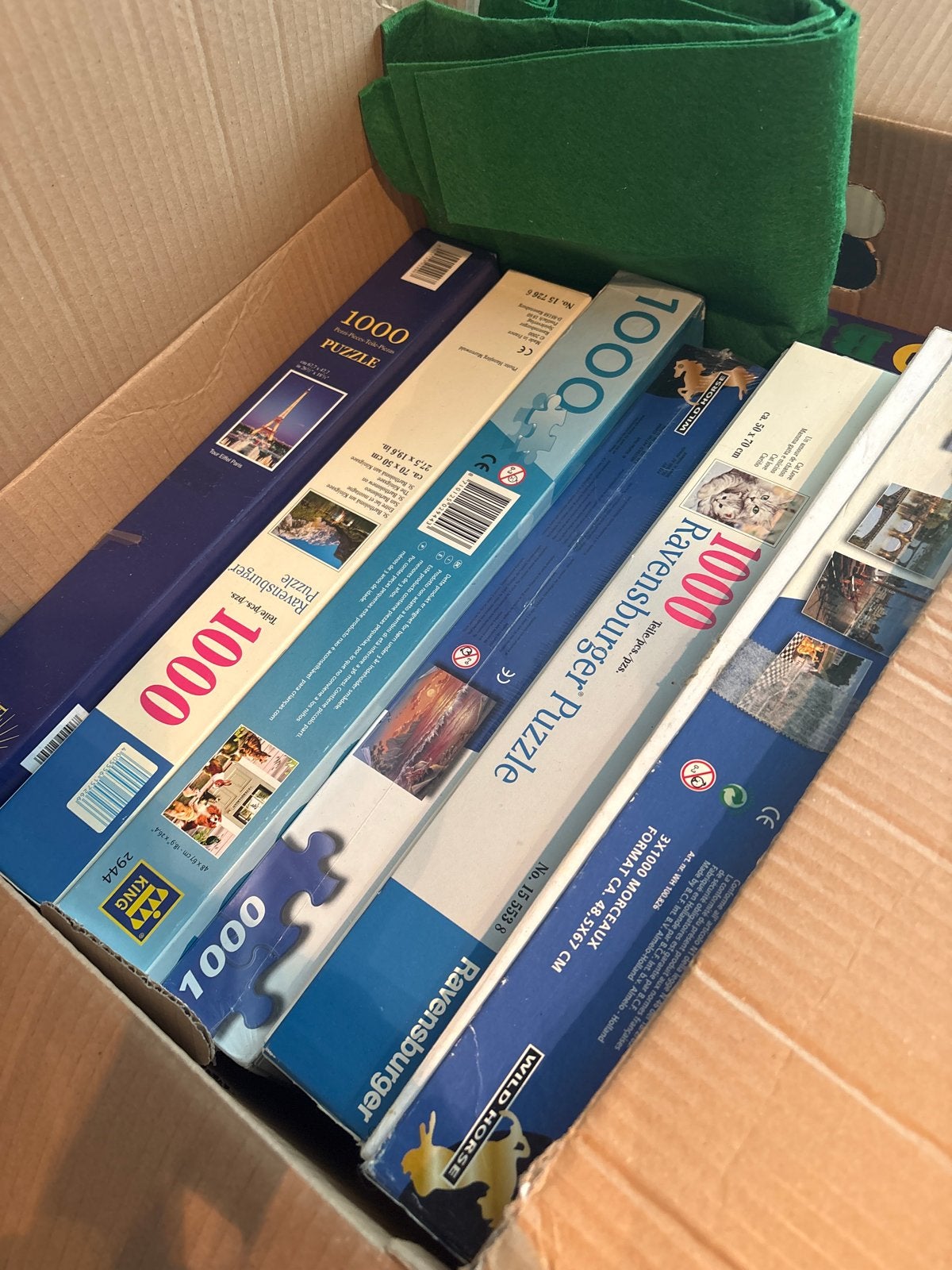 Doos vol met diverse puzzels en spellen, Ophalen of Verzenden, 500 t/m 1500 stukjes, Gebruikt, Legpuzzel
