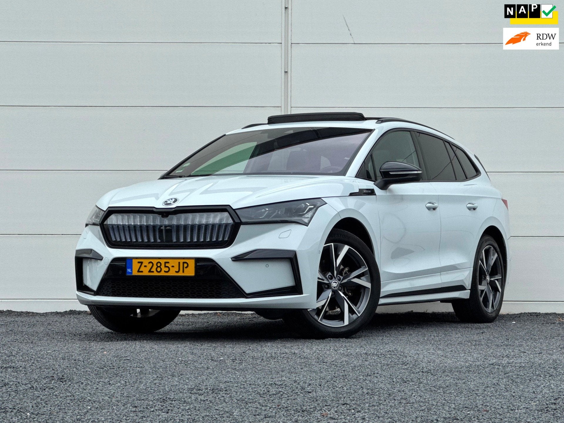 Skoda Enyaq 60 Sportline Org NL Pano Hud Canton Warmtepomp S, Auto's, Automaat, 397 km, Achterwielaandrijving, Gebruikt