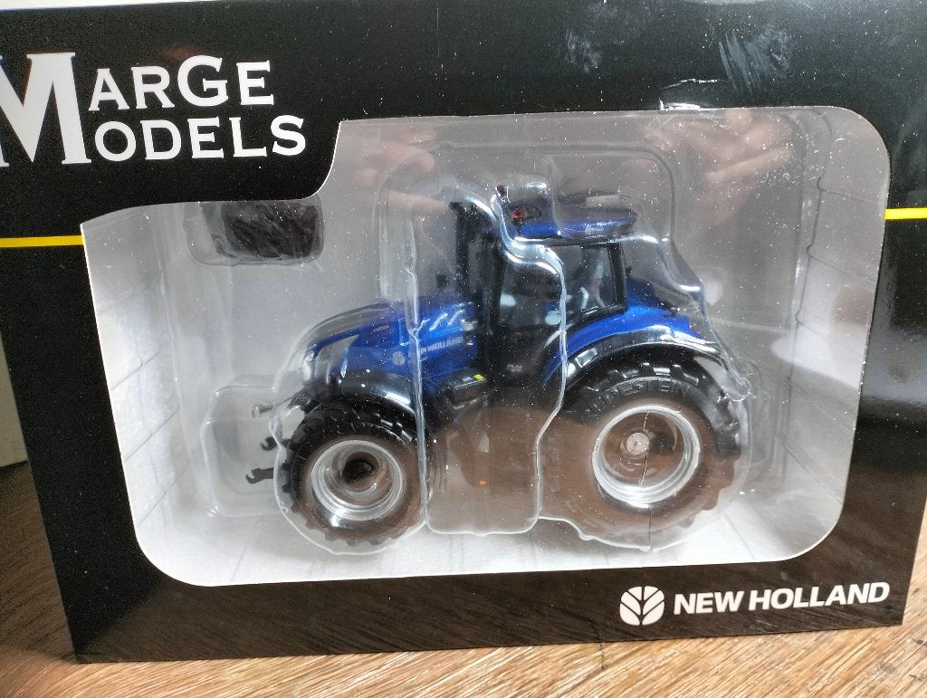 Te koop Marge Models New Holland T7.340 HD Bleu Power., Hobby en Vrije tijd, Ophalen of Verzenden, Nieuw, Tractor of Landbouw