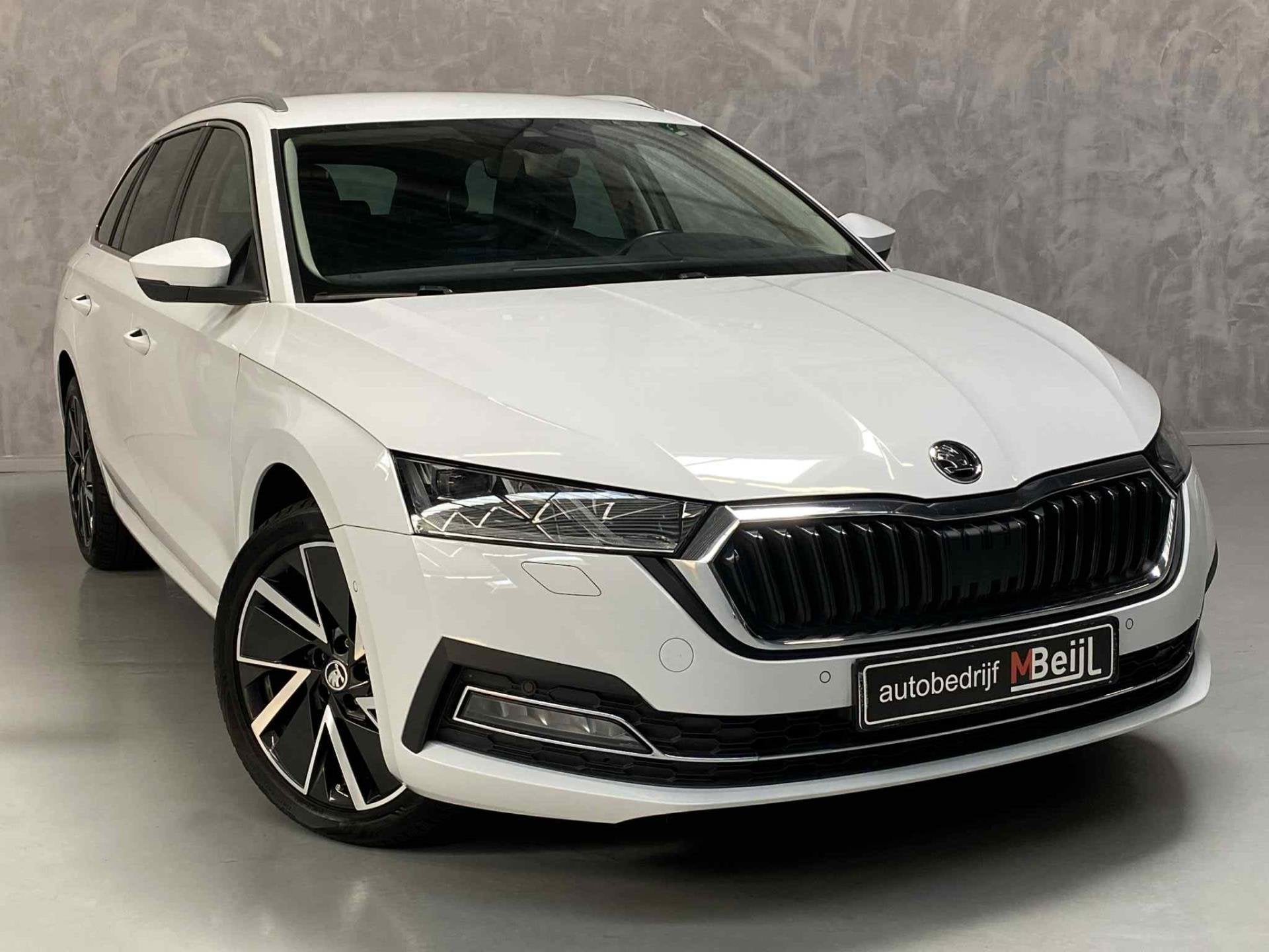 Skoda Octavia Combi 1.4 TSI iV PHEV Business Edition Plus /H, Auto's, Skoda, Gebruikt, Euro 6, 150 pk, Wit
