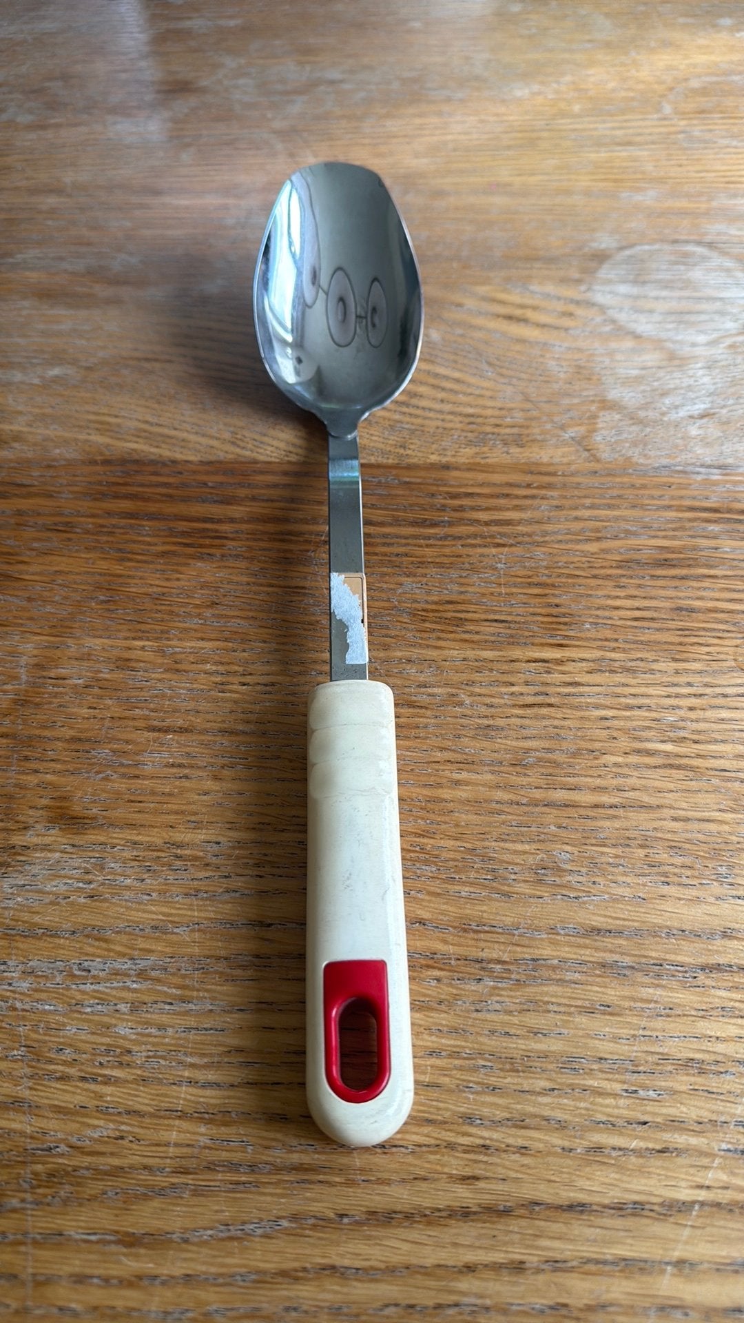 Vintage opschep lepel met kunststof handvat, Ophalen of Verzenden, Gebruikt, Rvs of Chroom, Los bestek