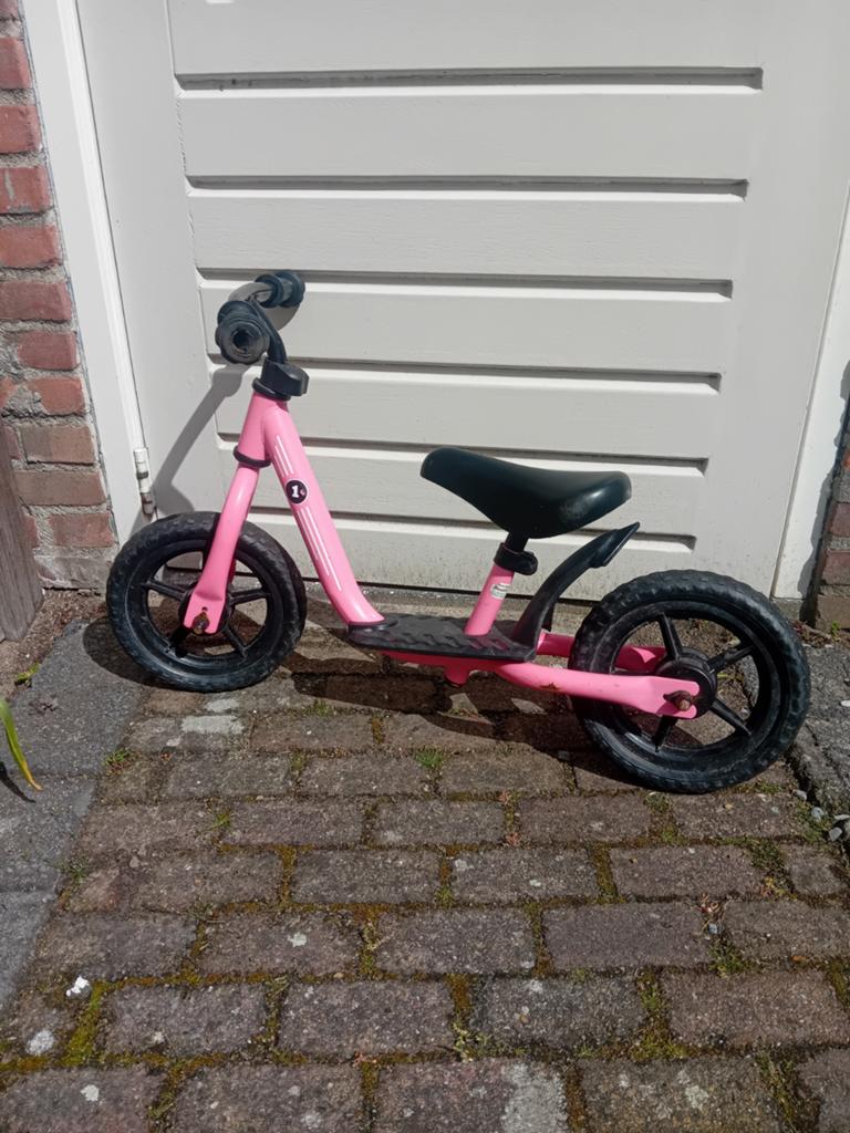 Roze loopfiets voor kinderen, Ophalen