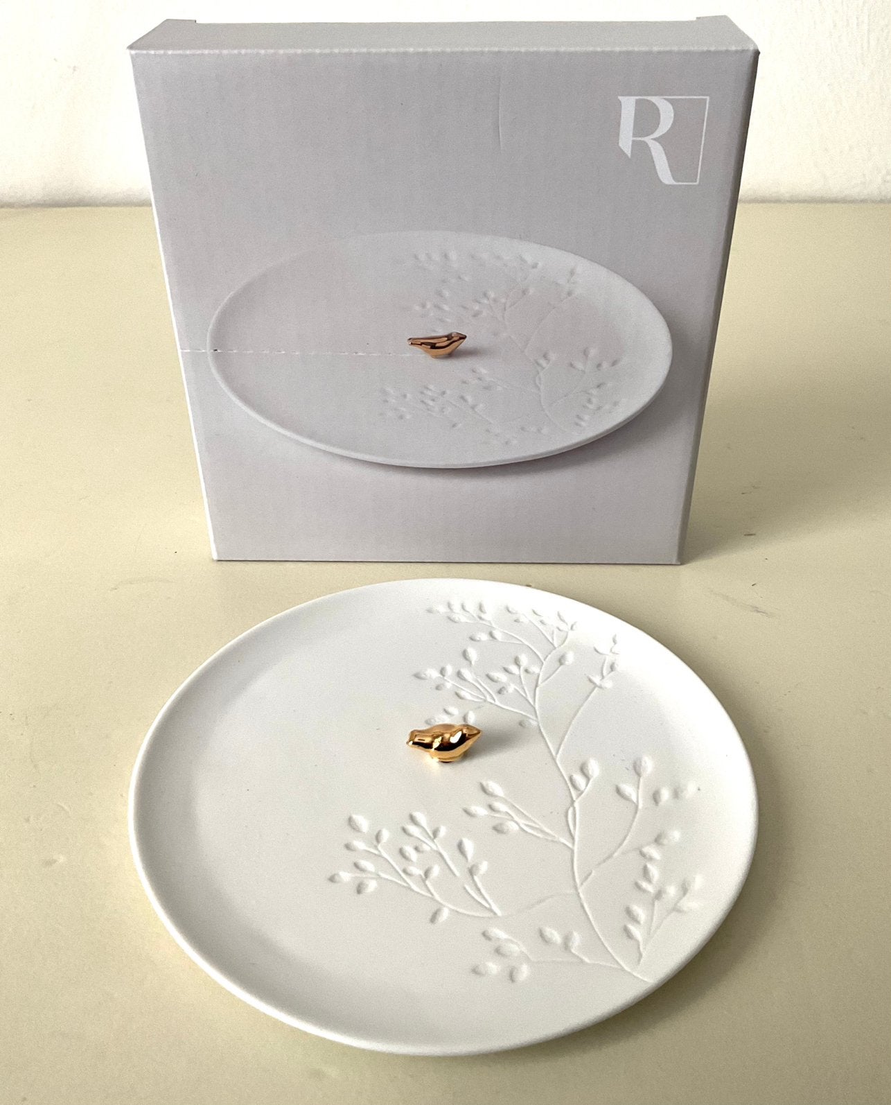 Rader bordje met gouden vogeltje, Ophalen of Verzenden, Nieuw, Porselein, Bord of Schaal