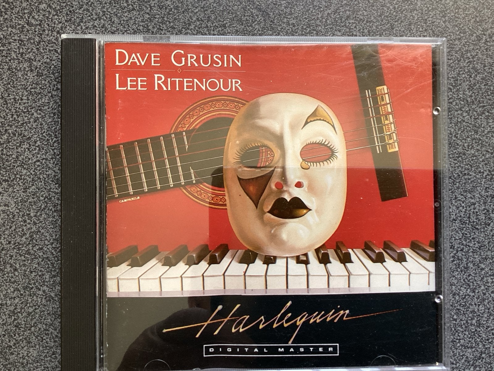 Dave Grusin & Lee Ritenour - Harlequin CD, Cd's en Dvd's, Ophalen of Verzenden, Zo goed als nieuw, Jazz, Inclusief doosje