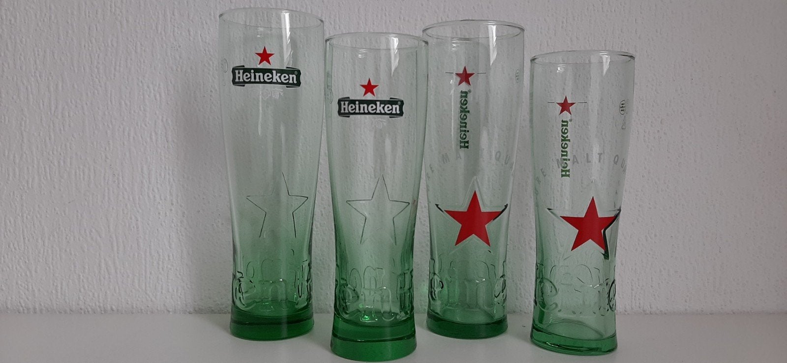 Heineken bierglazen - set van 4, Ophalen of Verzenden, Gebruikt