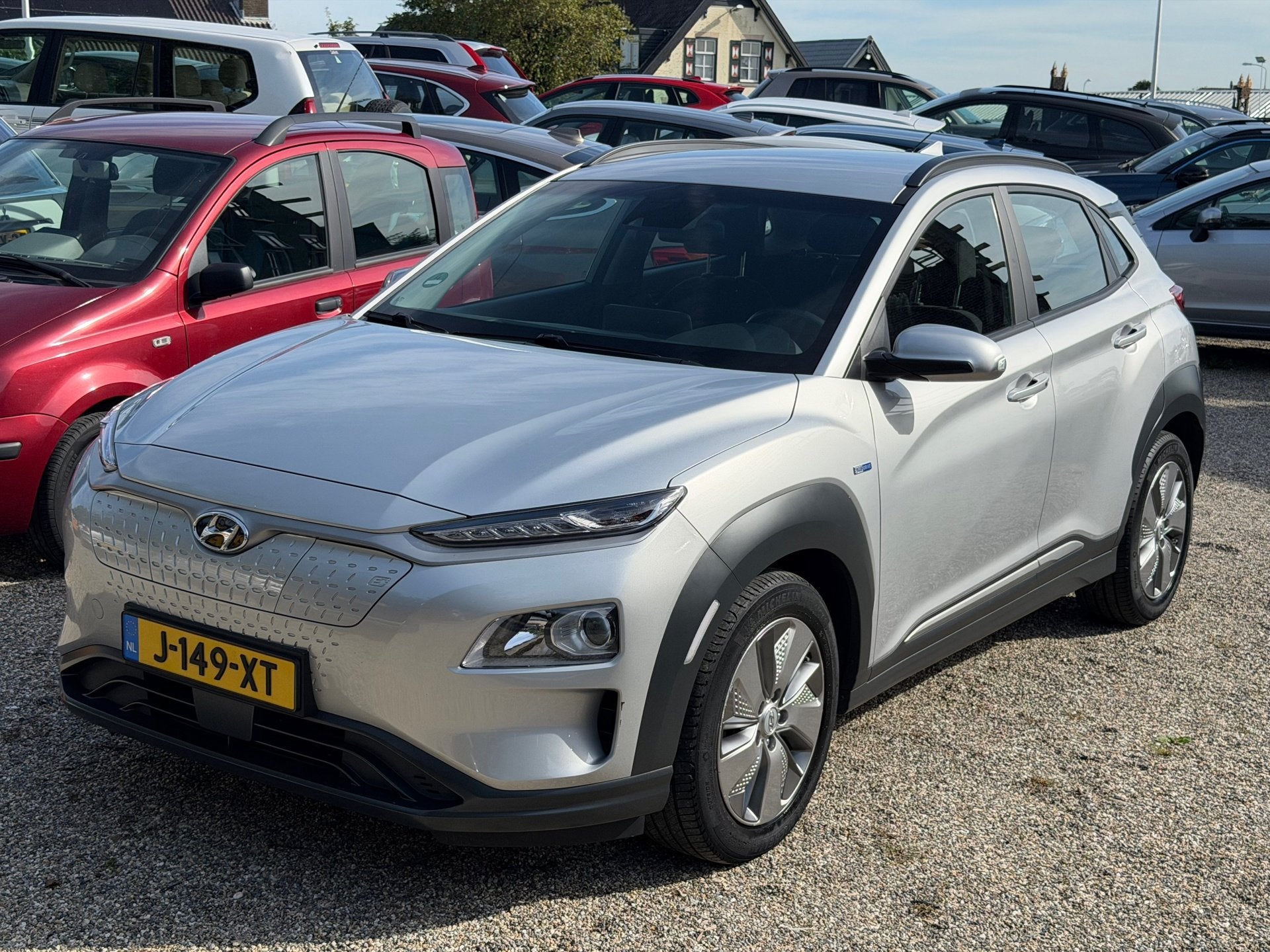 Hyundai Kona EV Comfort 64 kWh 99,1% SOH 1e Eig Dealer Onder, Auto's, Dealer onderhouden, Stof, Gebruikt, 174 min