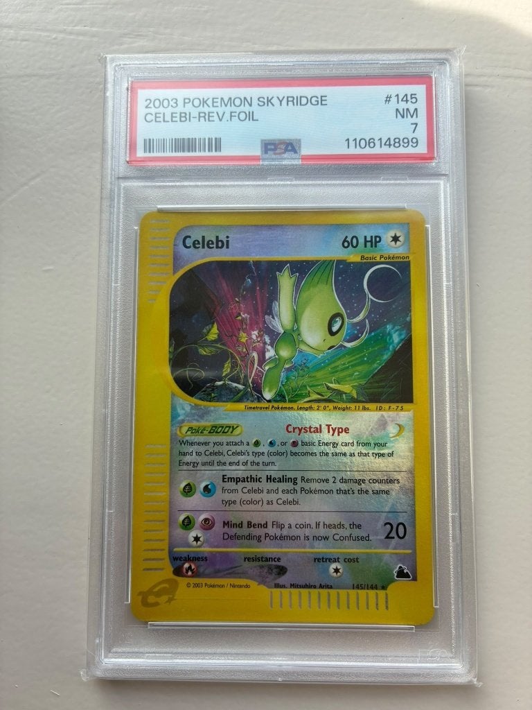 Celebi | Reverse Foil | PSA 7 | Skyridge, Hobby en Vrije tijd, Ophalen of Verzenden, Zo goed als nieuw, Losse kaart, Foil