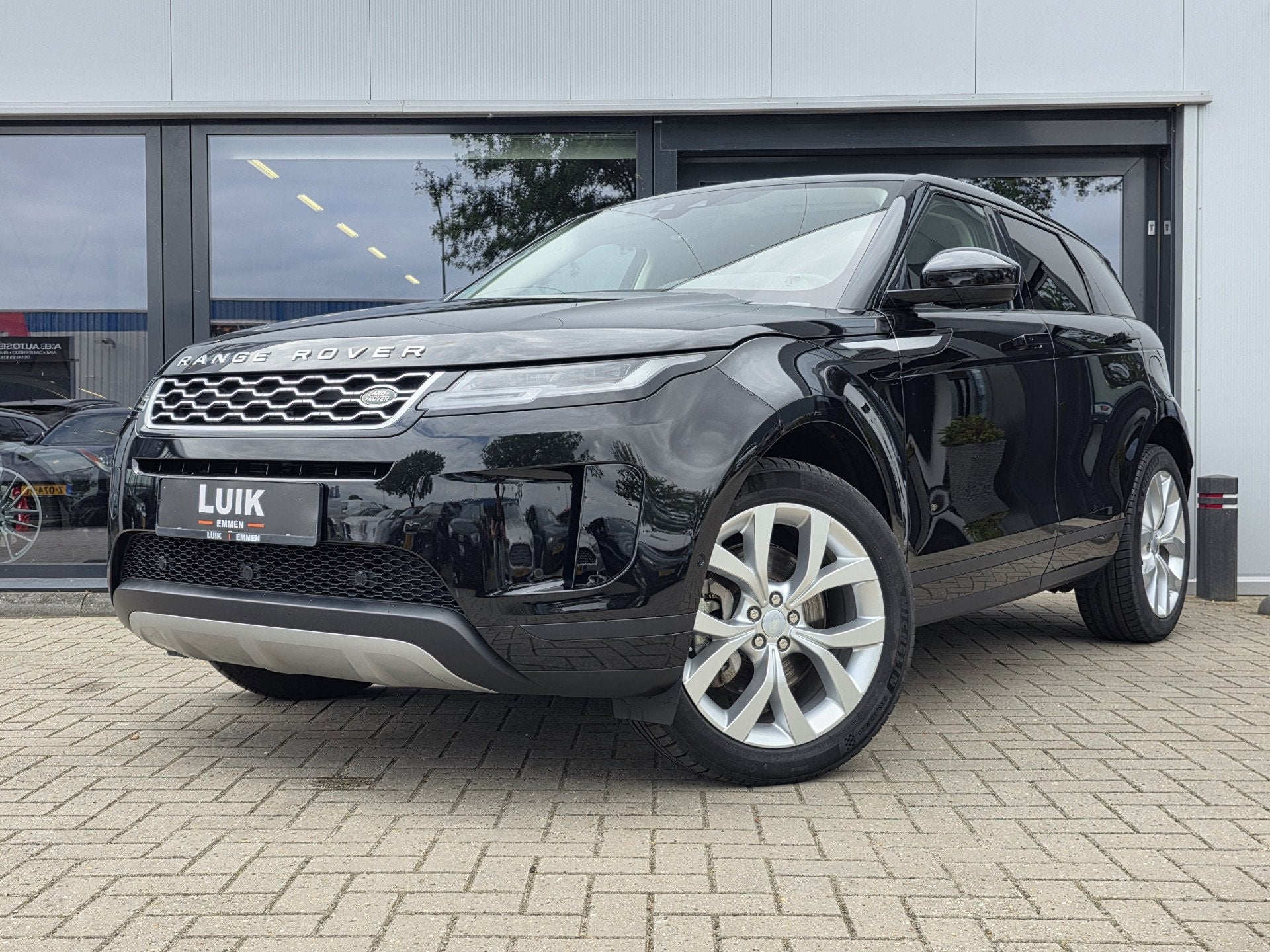 Land Rover Range Rover Evoque 1.5 P300e AWD SE (bj 2020), Auto's, Automaat, Zwart, Zwart, Bedrijf