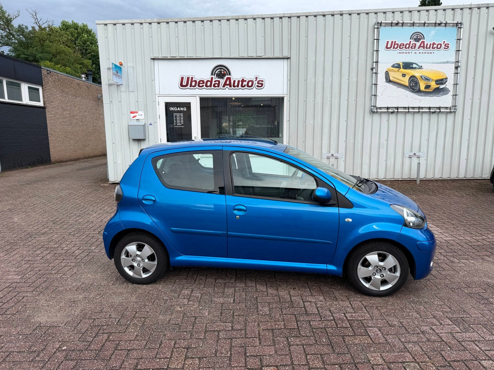 Toyota Aygo TOYOTA AYGO 1.0 12V DYNAMIC BLUE --AUTOMAAT NL A, Stof, Gebruikt, 68 pk, Origineel Nederlands
