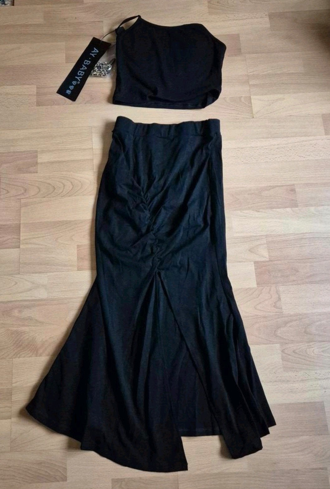 Nieuwe zwarte rok met top maat 122/128. Okselmaat 30 cm, Kinderen en Baby's, Kinderkleding | Maat 122, Ophalen of Verzenden, Nieuw