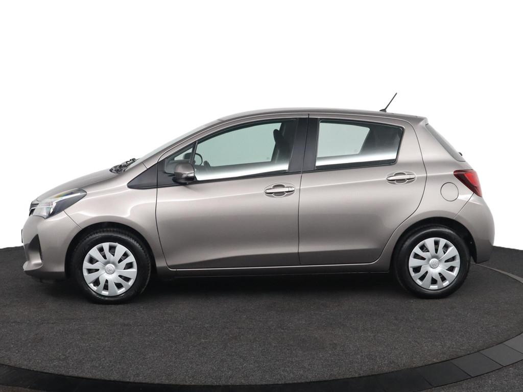 Toyota Yaris 1.3 VVT-i Aspiration |NAP|Dealeronderhouden|Aut, Auto's, Stof, Bruin, Bedrijf, 99 pk