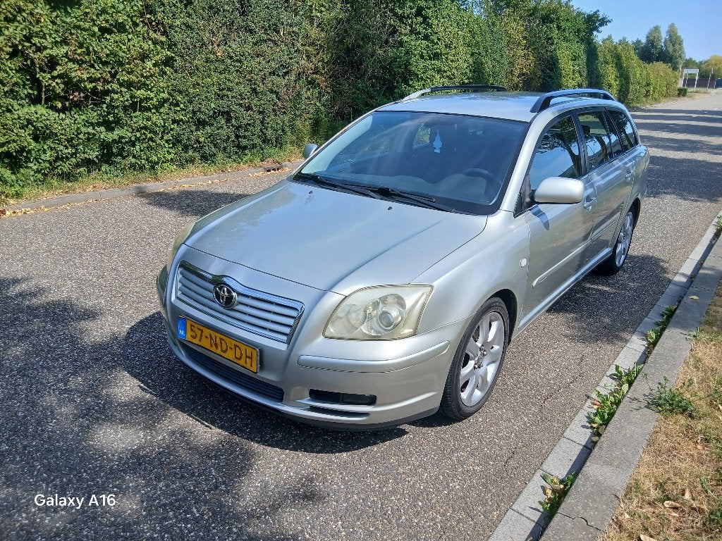 Toyota Avensis 2.0 16V WGN Linea Luna 2003 Grijs, Auto's, Voorwielaandrijving, Avensis, 4 cilinders, Origineel Nederlands