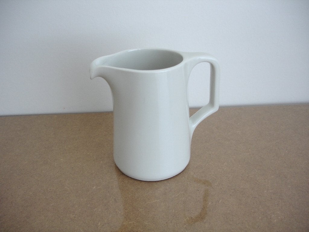 Antiek wit porseleinen melkkannetje, Huis en Inrichting, Overige typen, Ophalen of Verzenden, Zo goed als nieuw, Overige stijlen
