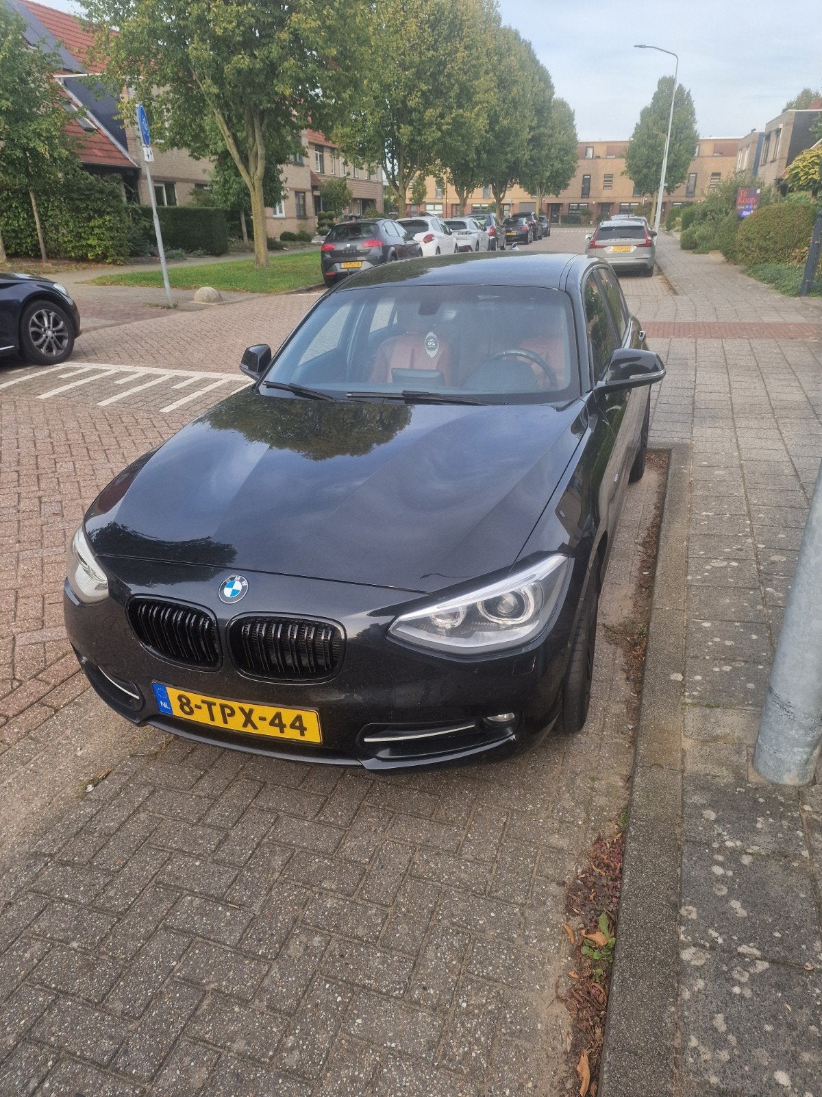 BMW 1-Serie 116i 136PK 5D Aut. 2014 Zwart, Auto's, 1295 kg, 4 cilinders, Zwart, Origineel Nederlands