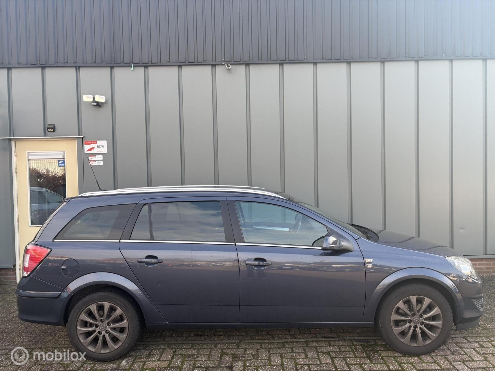 Opel Astra Wagon 1.6 111 years Edition - APK - NAP - Cruise, Voorwielaandrijving, Gebruikt, Zwart, Blauw
